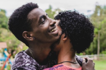 Ethnic people embracing