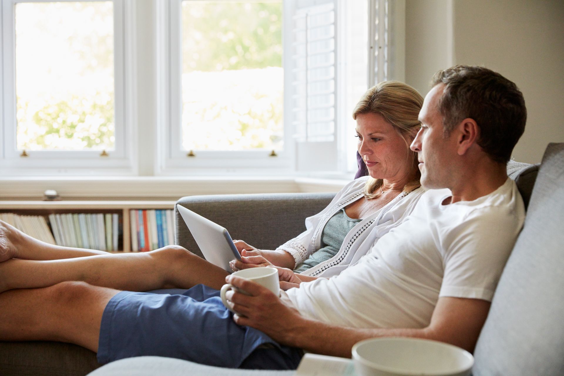 Couple sitting on sofa
