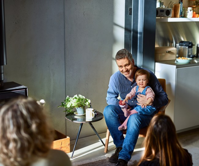 Man holding a toddler