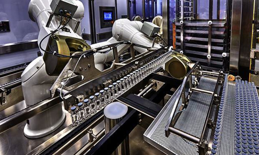 Automated machine producing vaccines